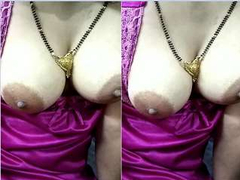 Slutty Indian milf shows her huge nipples while her boyfriend isn't home