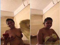 Stunning desi brunette with big tits captured by her loves in the bedroom