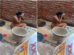 Hidden Cam catches busty Indian woman gets wet during a sexy outdoor bathing