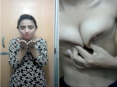 Young Desi is pressing her own natural tits in a video that is totally XXX