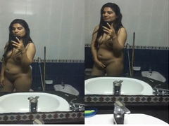 Desi woman is recording herself in the bathroom before getting lots of XXX