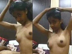 Slender Desi teen with small natural boobs and long legs prepares for XXX