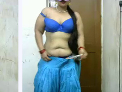 Desi aunty has amazing XXX curves and she is stripping before twerking and more