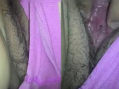 Hubby fingering the trimmed wet pussy of the chubby desi wife in a close up